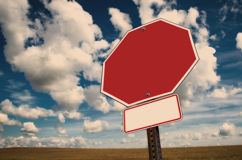 Canva – Stop Sign With Clouds In The Background