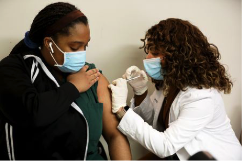 Tears of relief as workers at N.J. hospital besieged by coronavirus receive vaccine